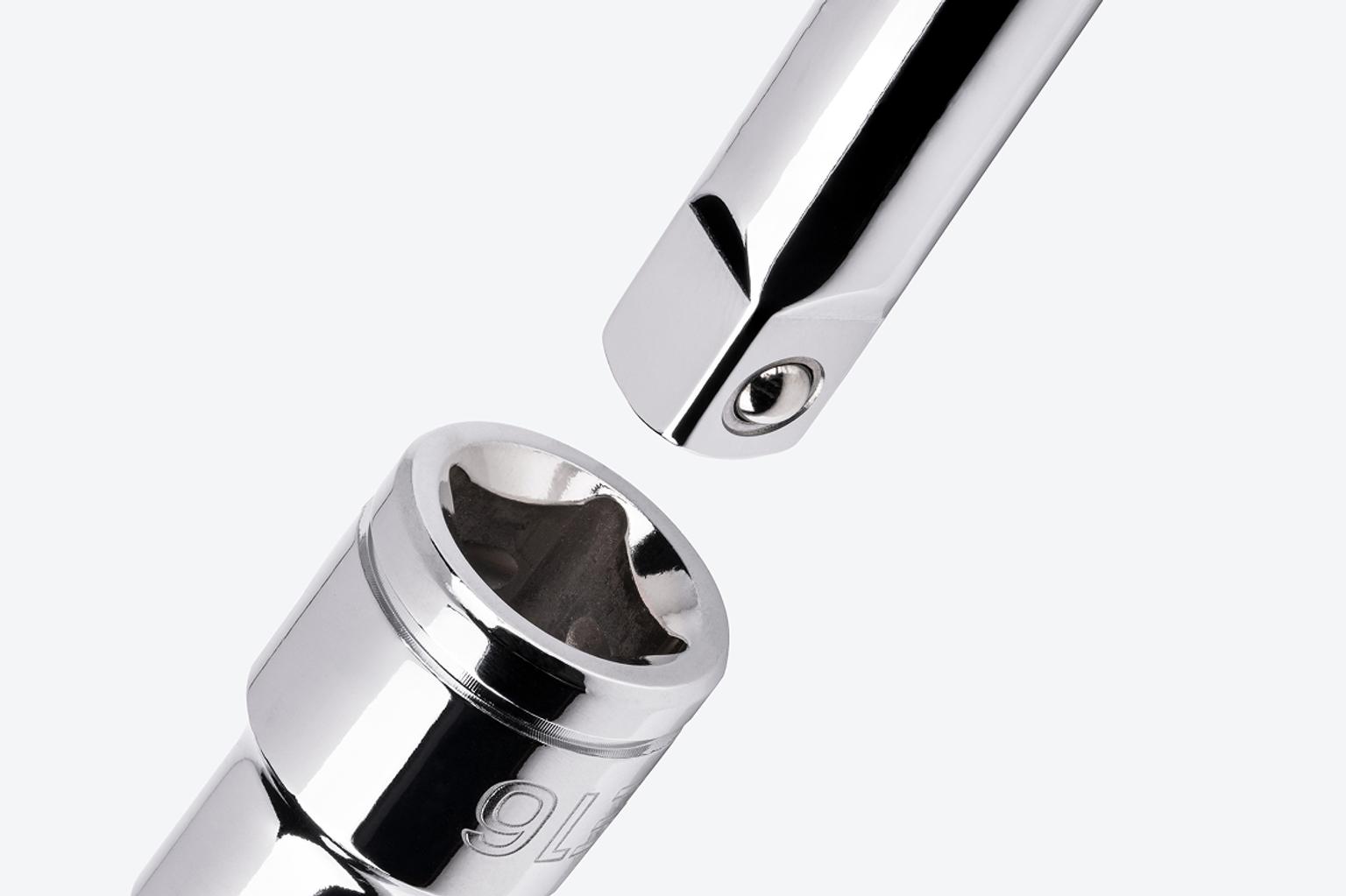A hand drive extension going into the drive end of a Tekton 1/2 Inch Drive x E16 External Star Socket.