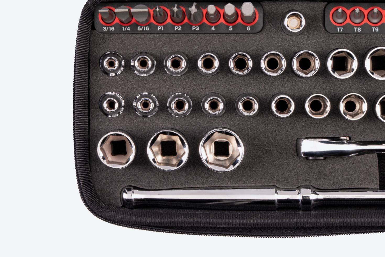 Inside of the case, showing bits, 6-point sockets, and ratchets