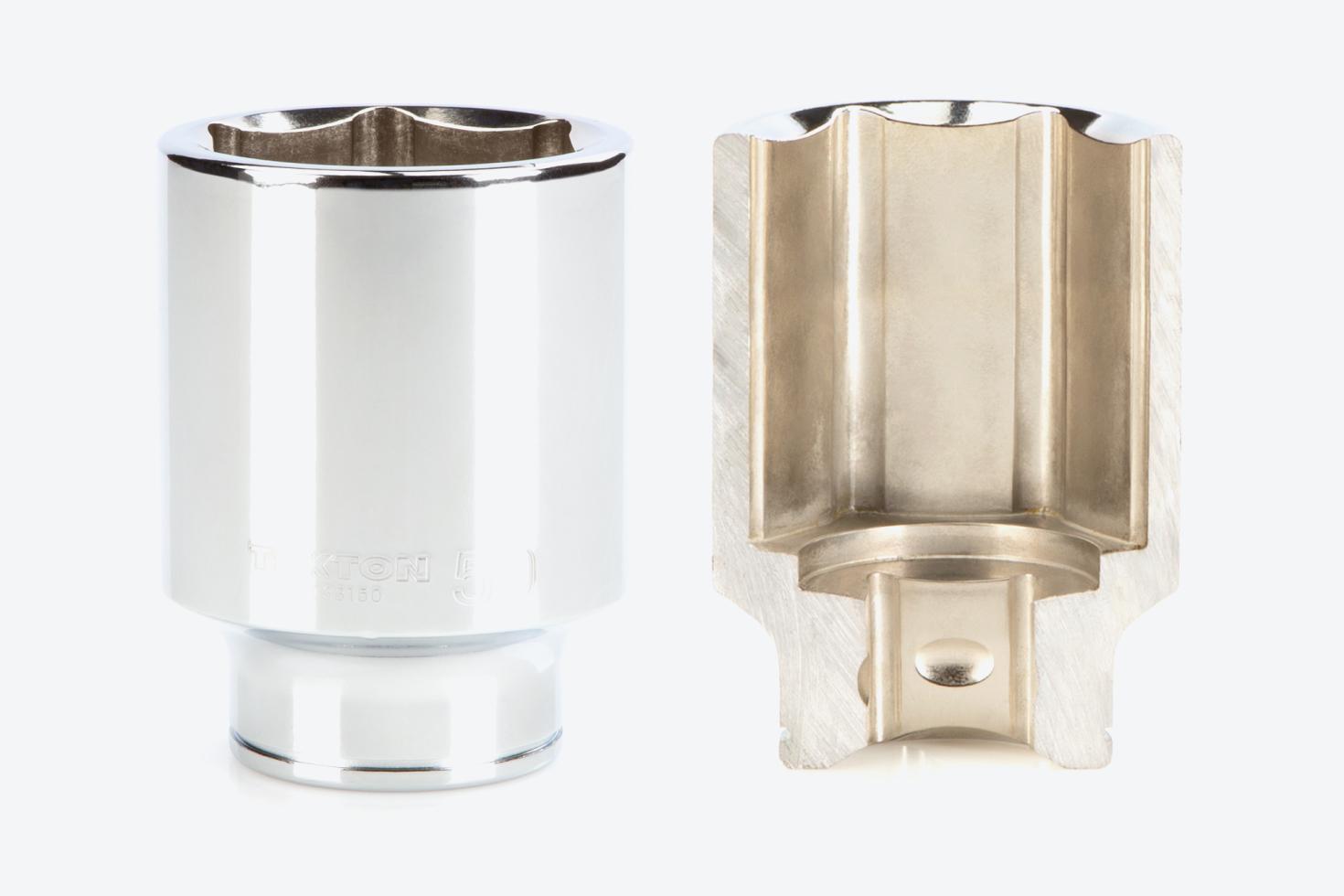 A 6-point deep socket next to another socket that's cut in half, showing the exterior and interior finishes