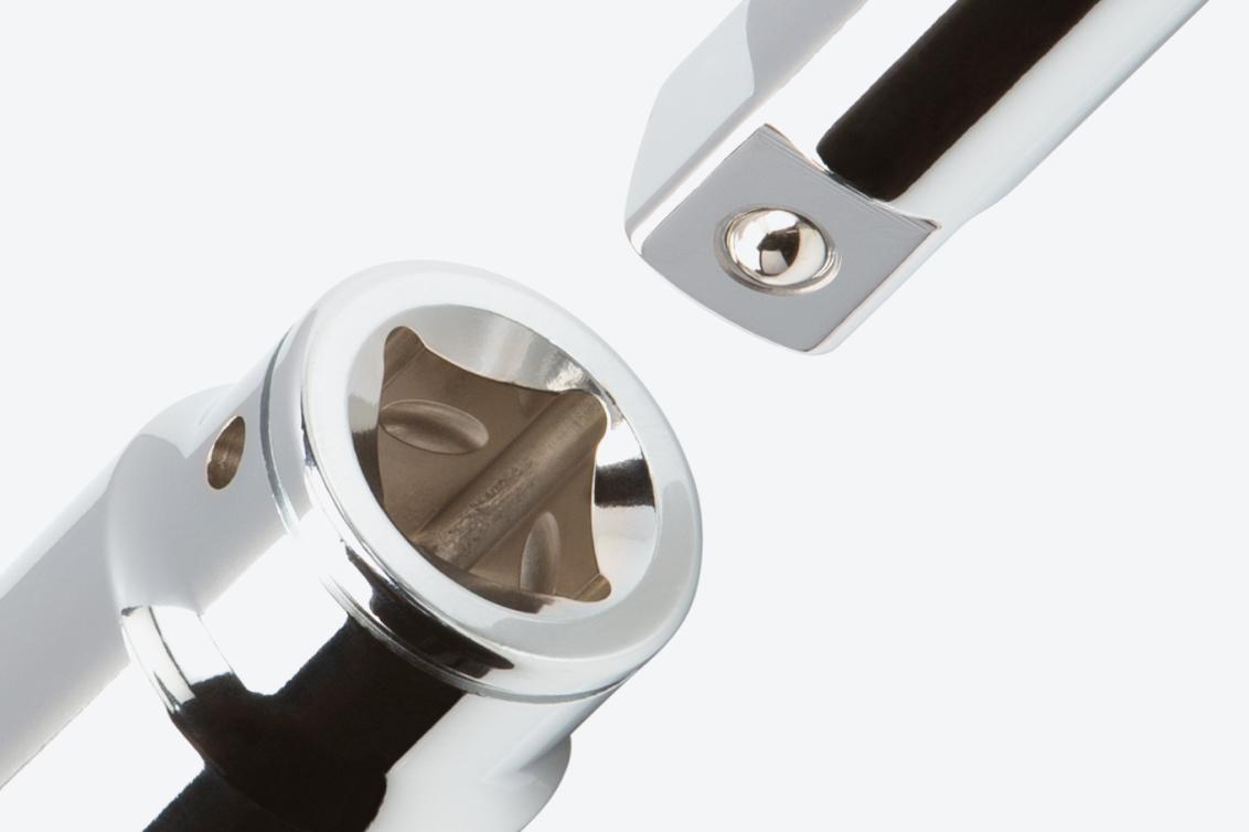 Image of the drive square end of a 3/4 inch drive socket, showing the detent grooves and beveled inner rims.