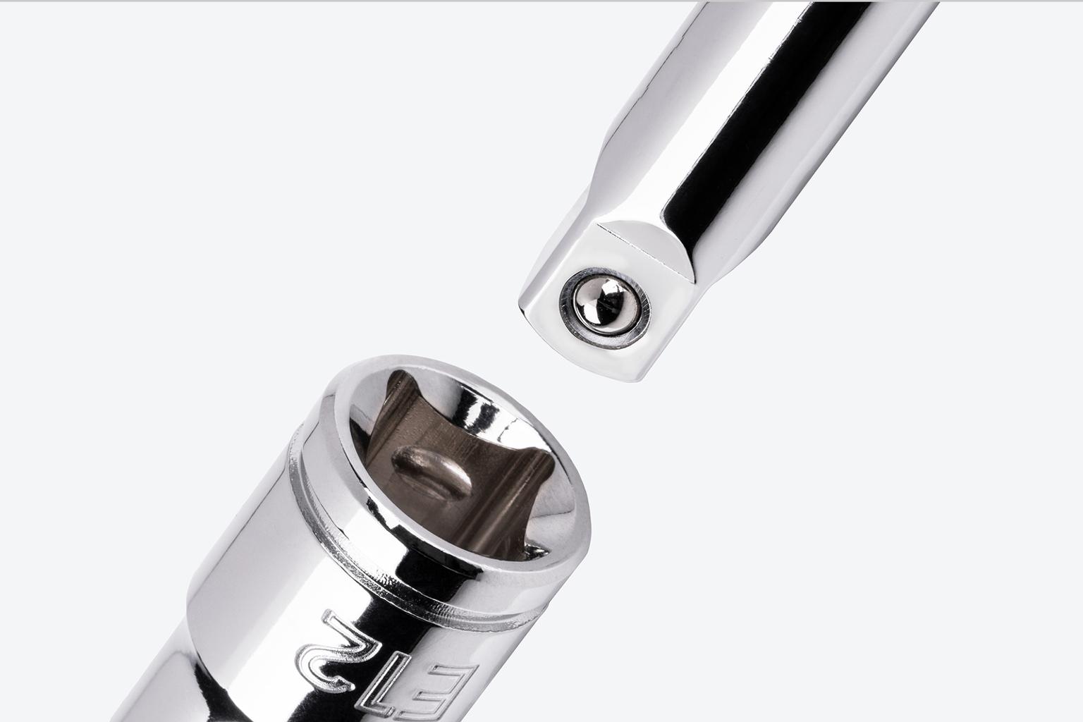 A hand drive extension going into the drive end of a Tekton 3/8 Inch Drive x E12 External Star Socket.