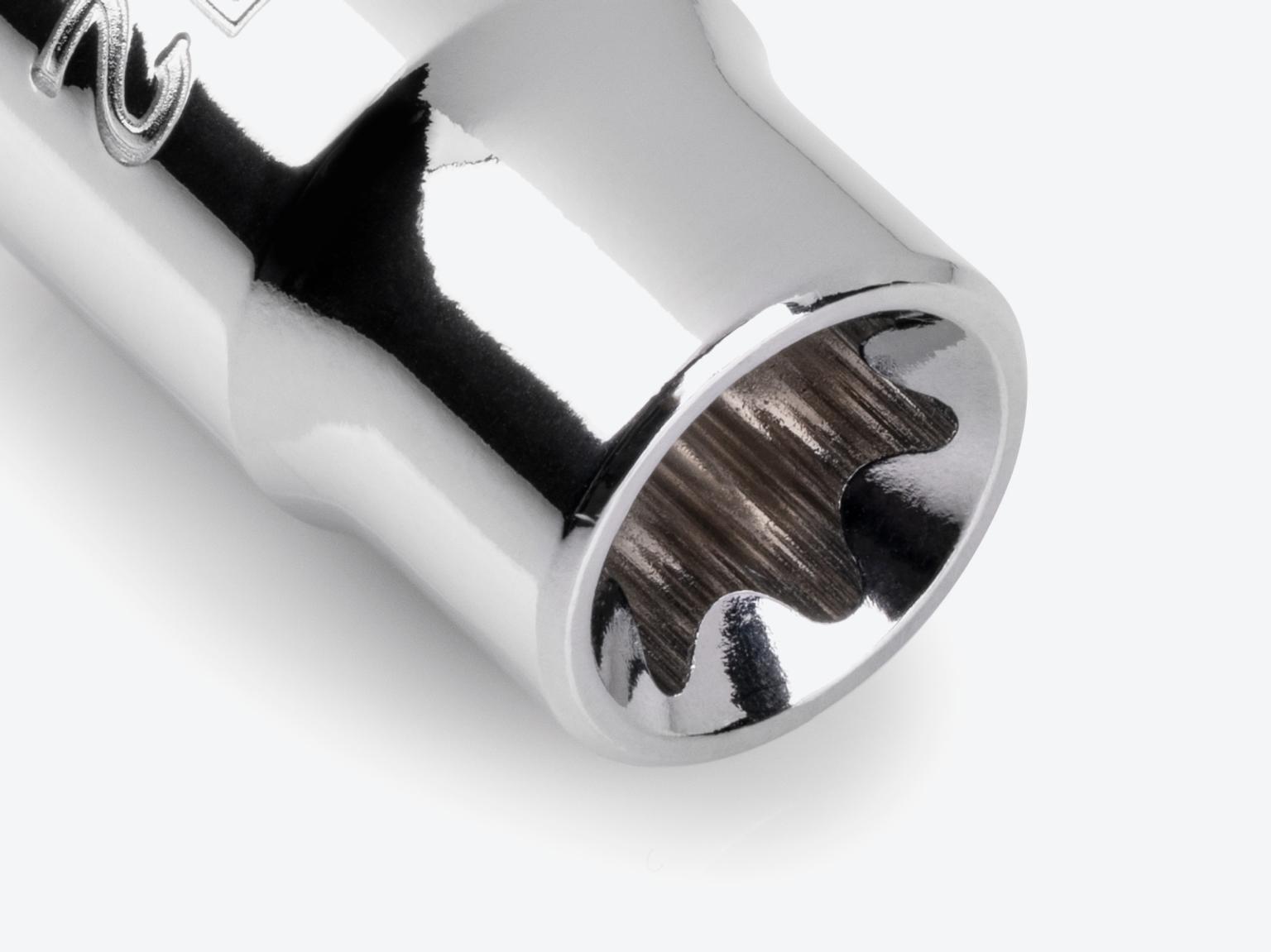 Tekton 3/8 Inch Drive x E12 External Star Socket #SHD12412 at an angle, showing the inside of the socket.