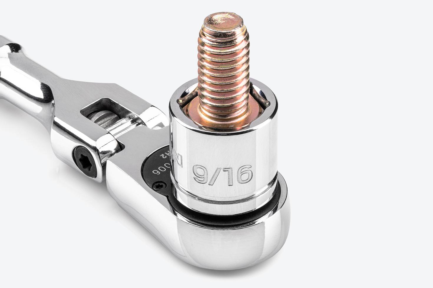 A bolt in a 9/16 inch extra-shallow 6-point socket on a flex head ratchet. The bolt head is fully engaged in the hex of the socket.