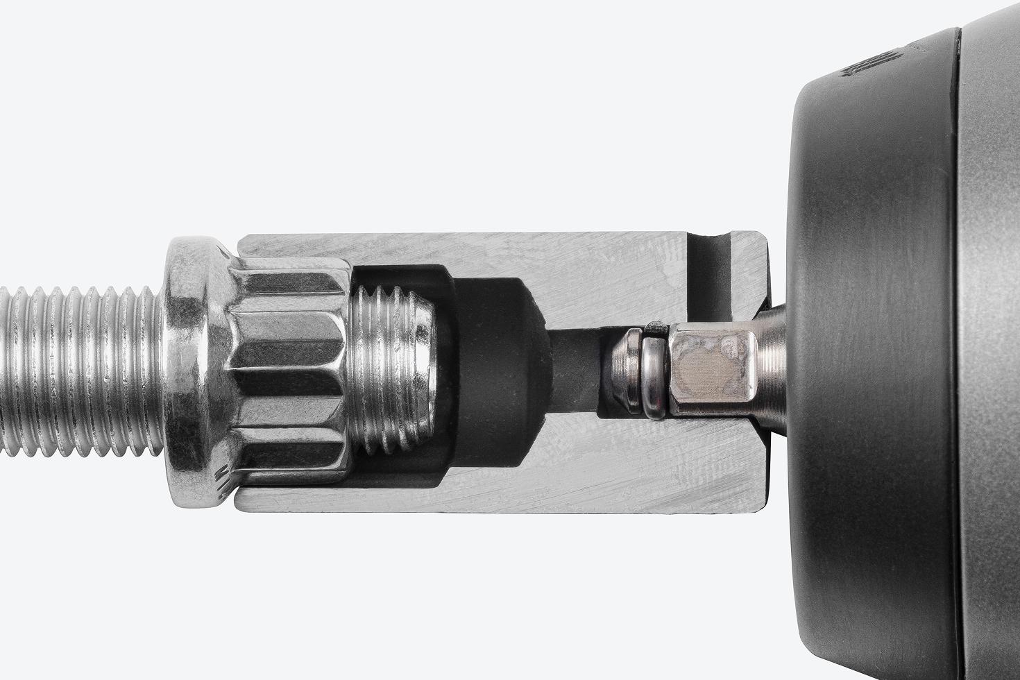 A semi-deep 12-point impact socket cut in half to show the full-length socket well