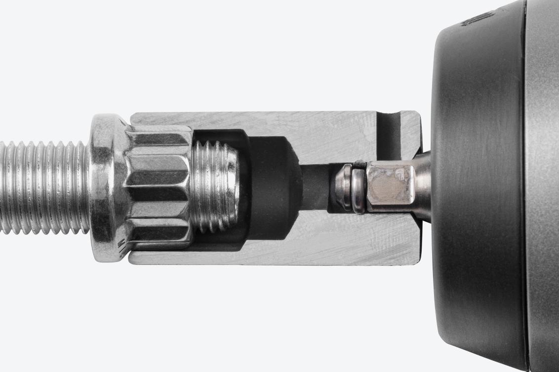 A semi-deep 12-point impact socket cut in half to show the full-length socket well