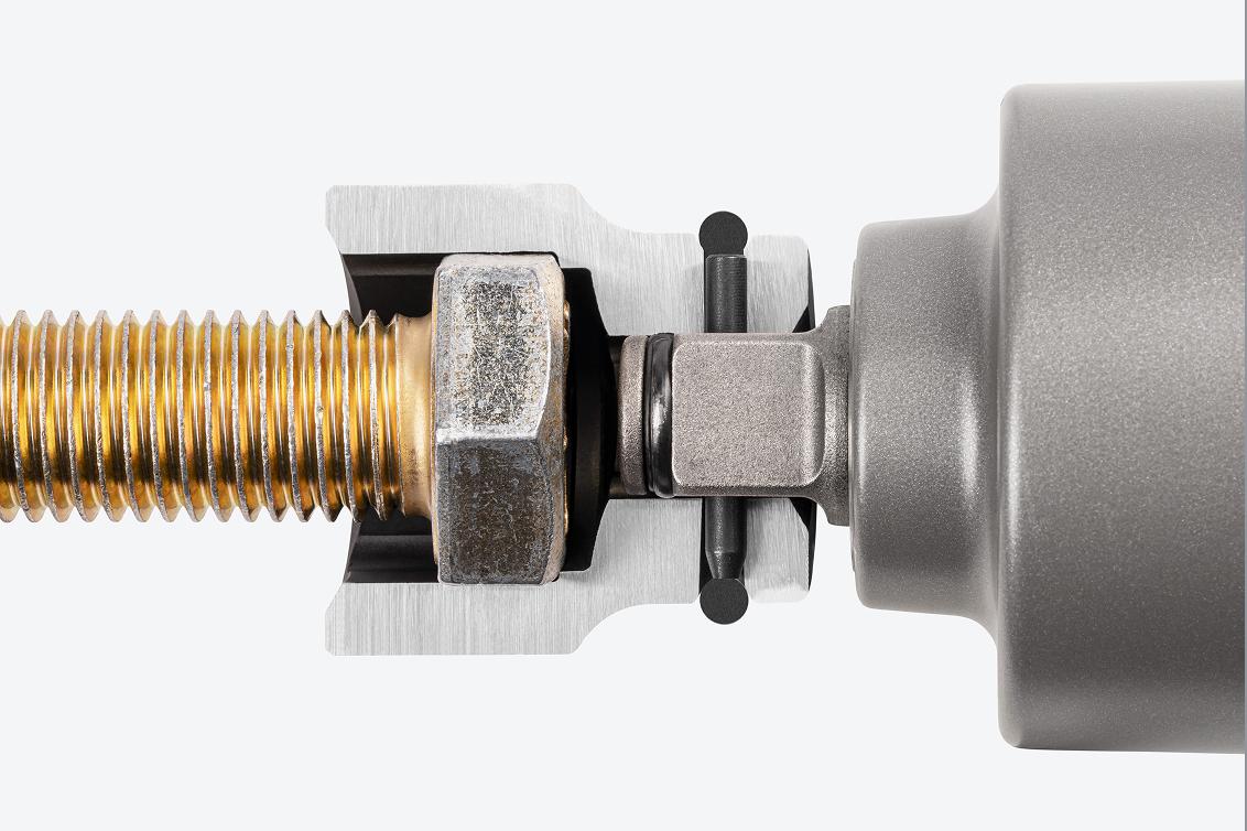 A socket cut in half with a fastener, showing how far the well extends into the socket, allowing for better engagement with fasteners.