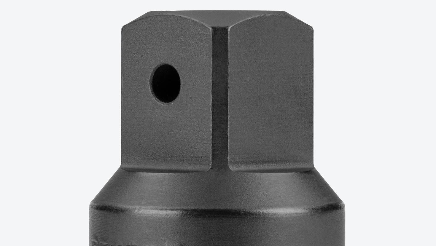 Close-up view of the through hole on a Tekton 3/4 inch drive impact adapter.
