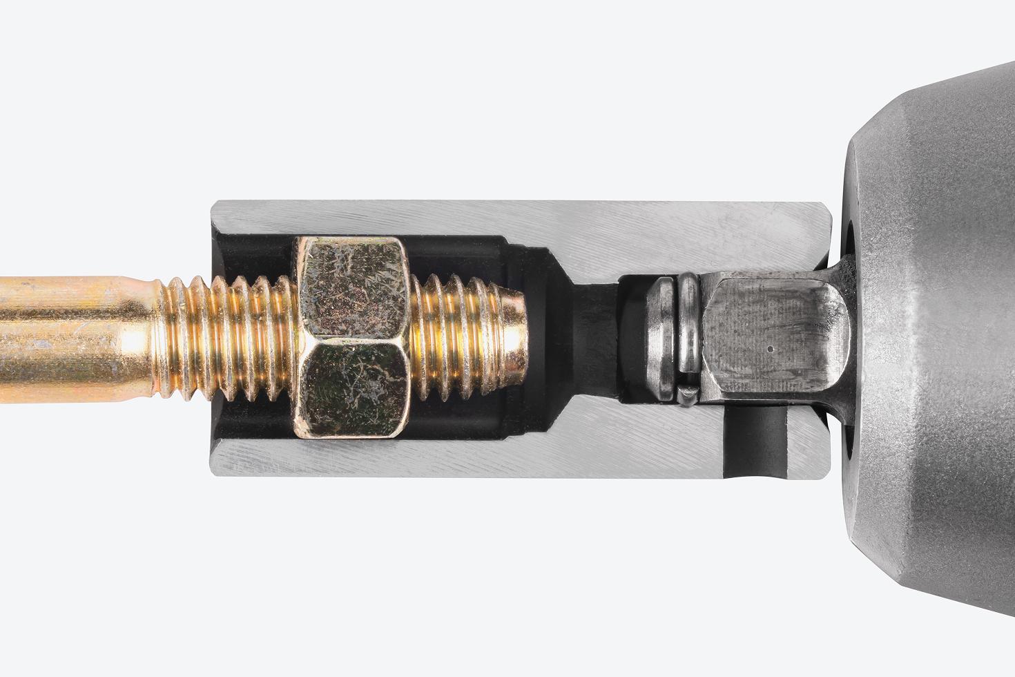 A semi-deep 6-point impact socket cut in half to show the full-length socket well