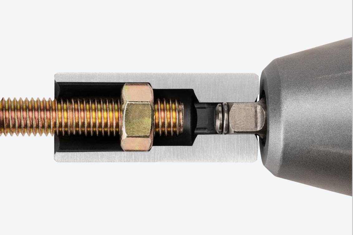 A deep 6-point impact socket cut in half to show the full-length socket well