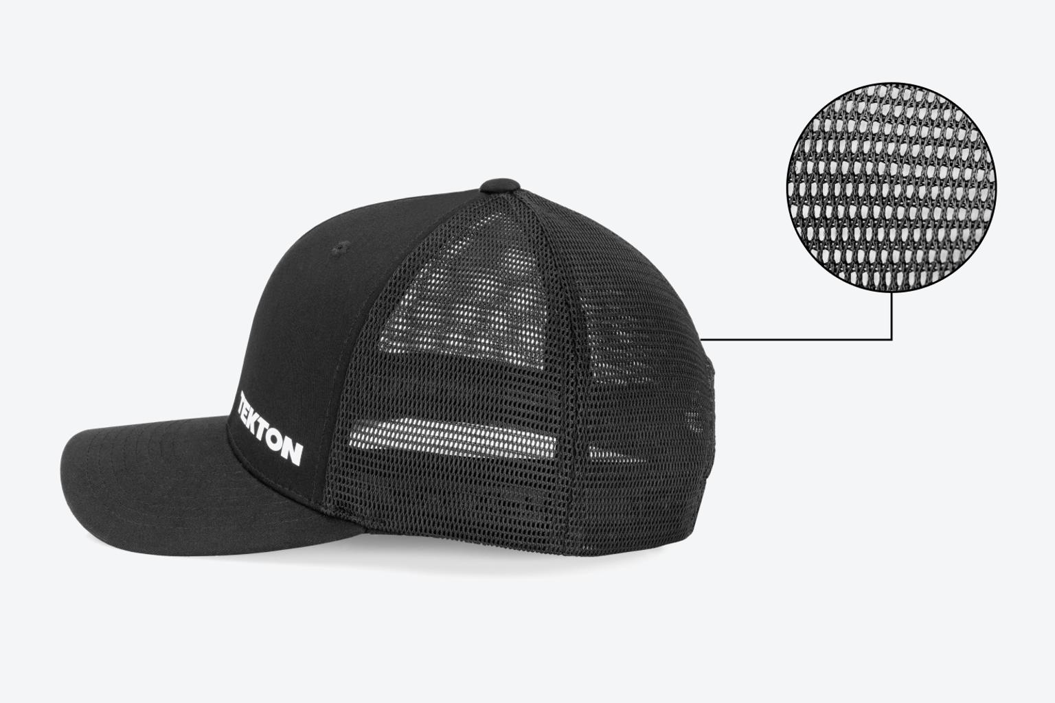 A black mid profile Tekton hat sitting on a light gray surface. An inset image shows a close-up view of the mesh.