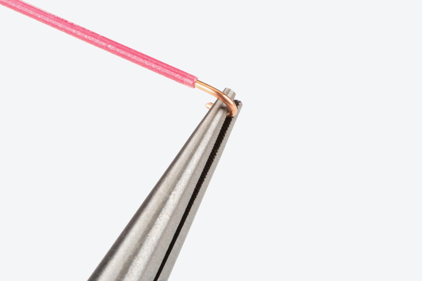 Pliers holding wire