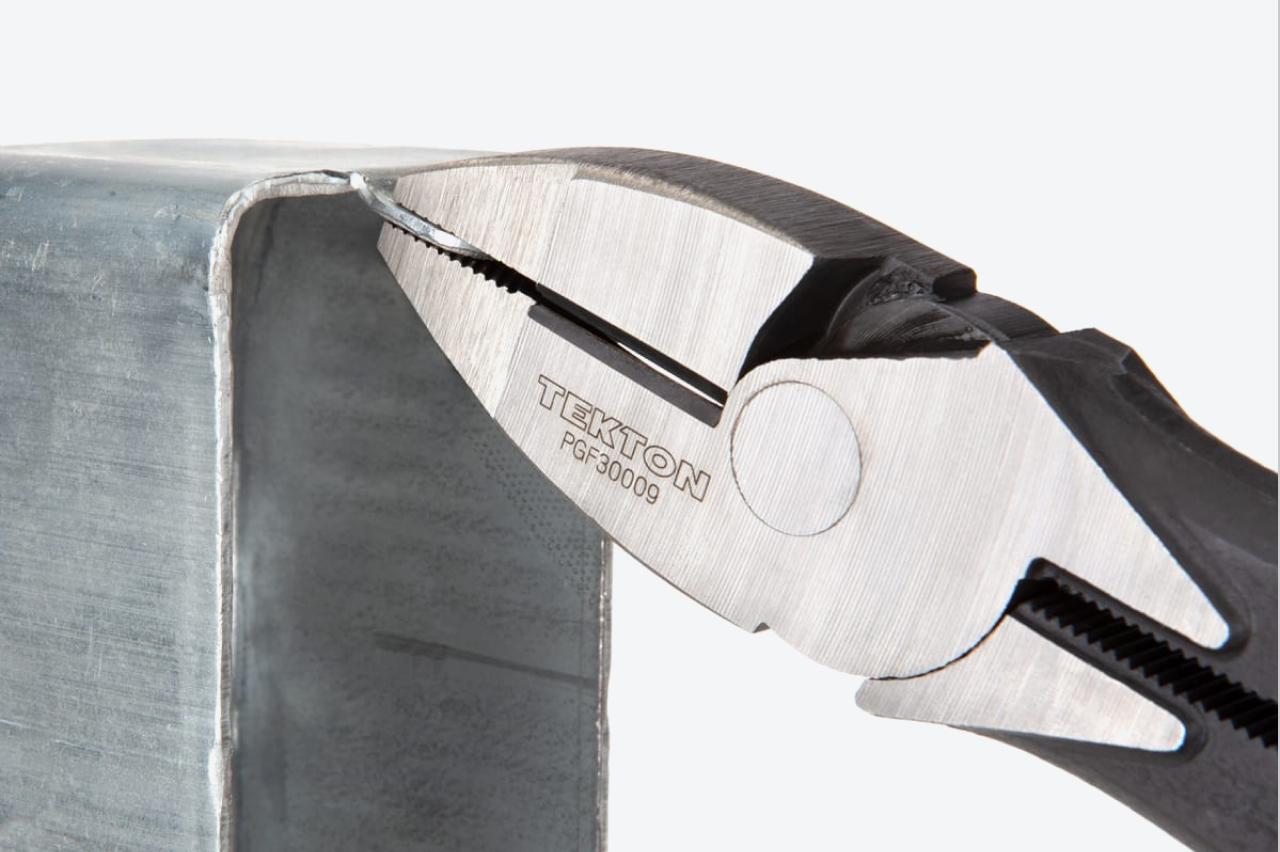 A lineman's pliers clamping down on flat stock