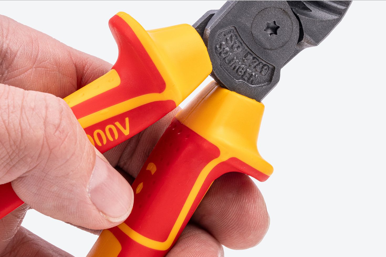 Close up view of the flared handles of Tekton insulated diagonal cutting pliers #PVC00007.