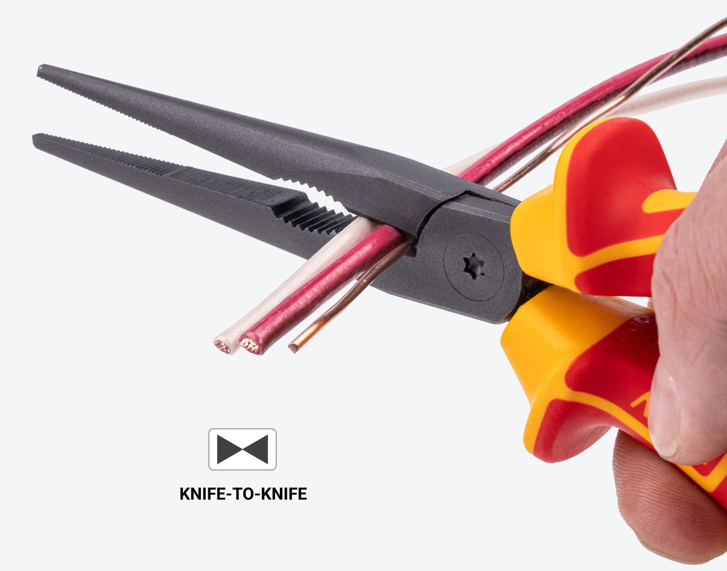 Tekton insulated long nose pliers #PVG10008 cutting through wire.