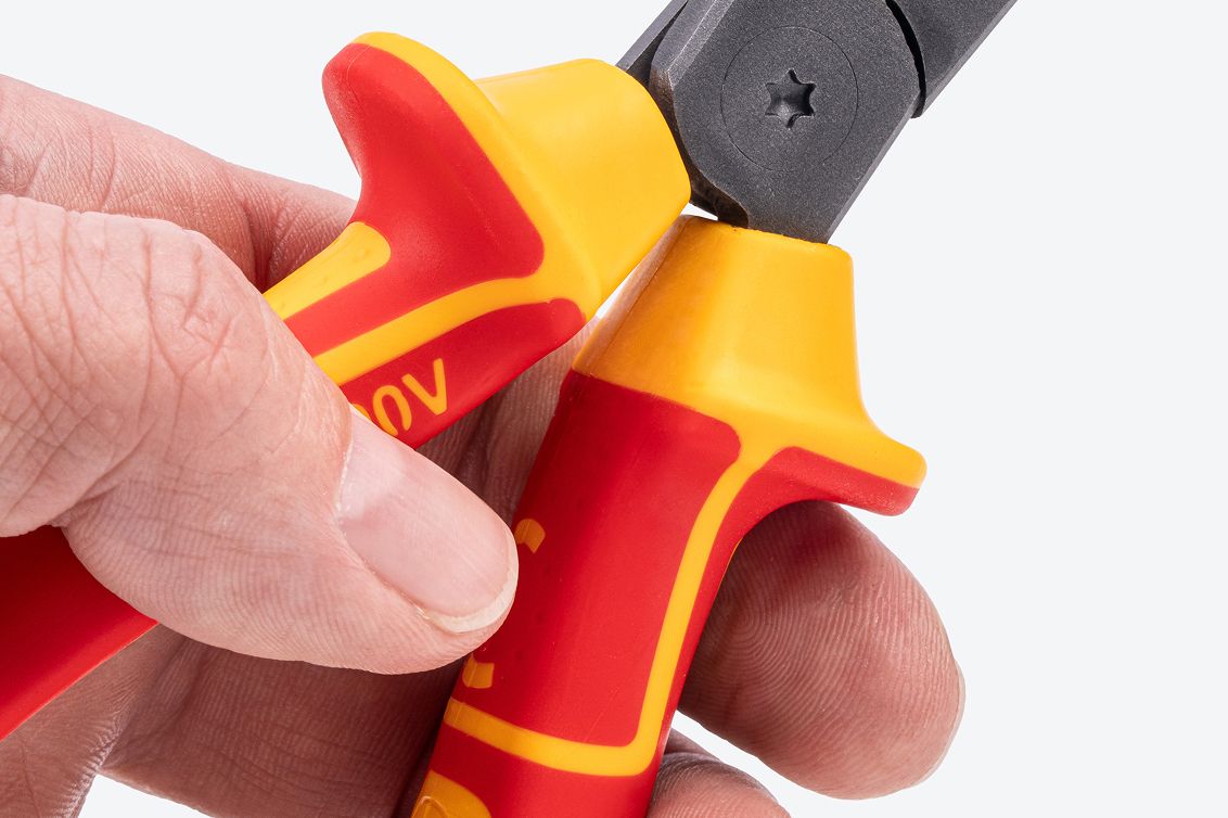 Close up view of the flared handles of Tekton insulated long nose pliers #PVG10008.