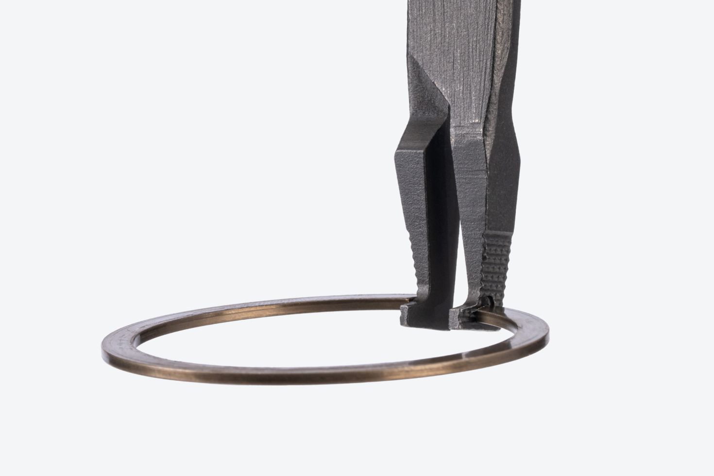 A ring on a pair of Tekton 90-degree tip lock ring pliers #PRR53205