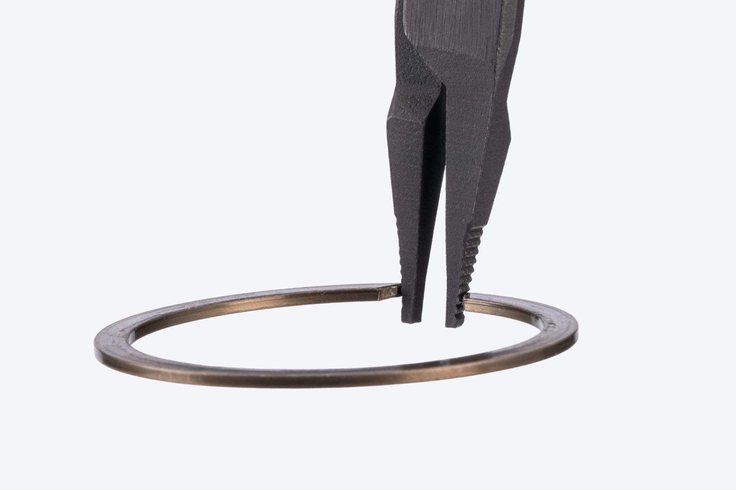 A ring on a pair of Tekton lock ring pliers #PRR53200