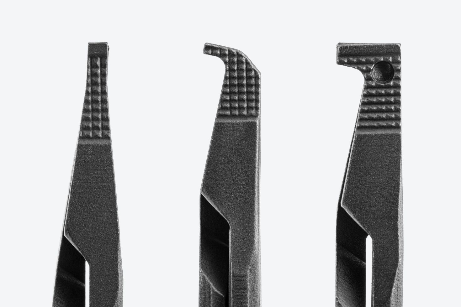 Close up image of straight, curved, and 90-degree tips of Tekton lock ring pliers