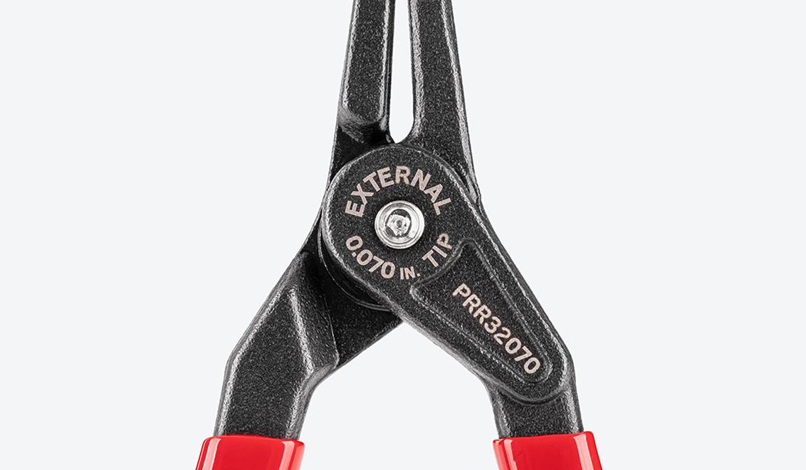 Close-up view of the markings on an external retaining ring pliers.