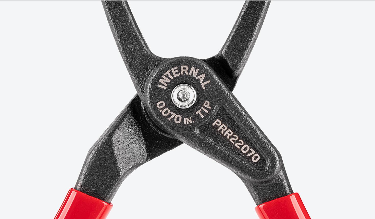 Close-up view of the markings on an internal retaining ring pliers.
