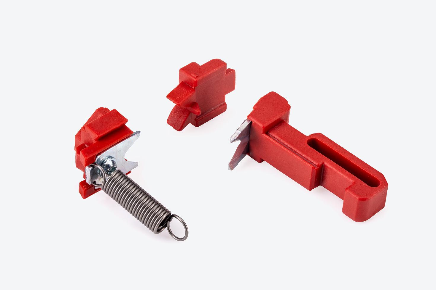 The components of a Tekton Automatic Wire Stripper Replacement Blade Kit #PSP9X001 laid out
