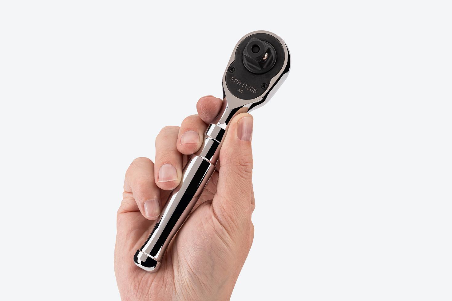 A 1/2 inch drive stubby ratchet being held