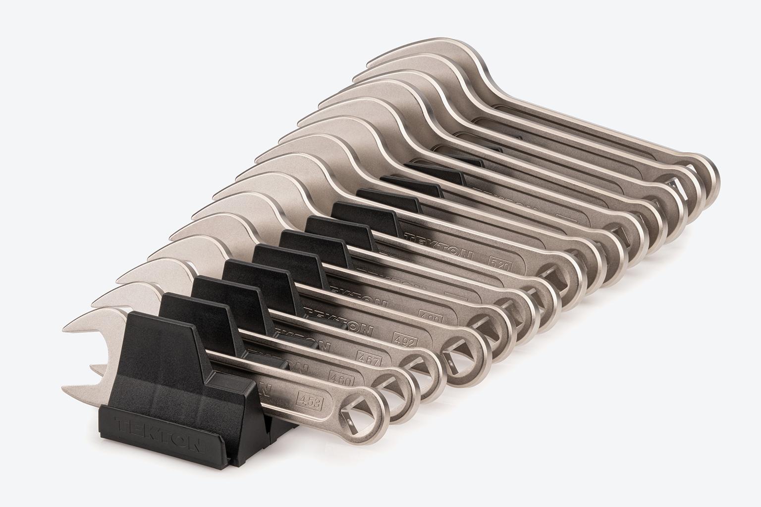 A set of Tekton service wrenches in black modular wrench organizers.