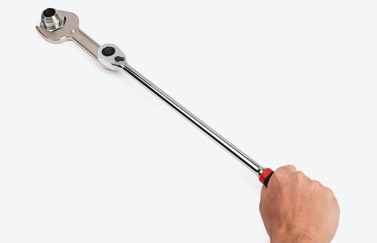 A long ratchet connected to a Tekton service wrench