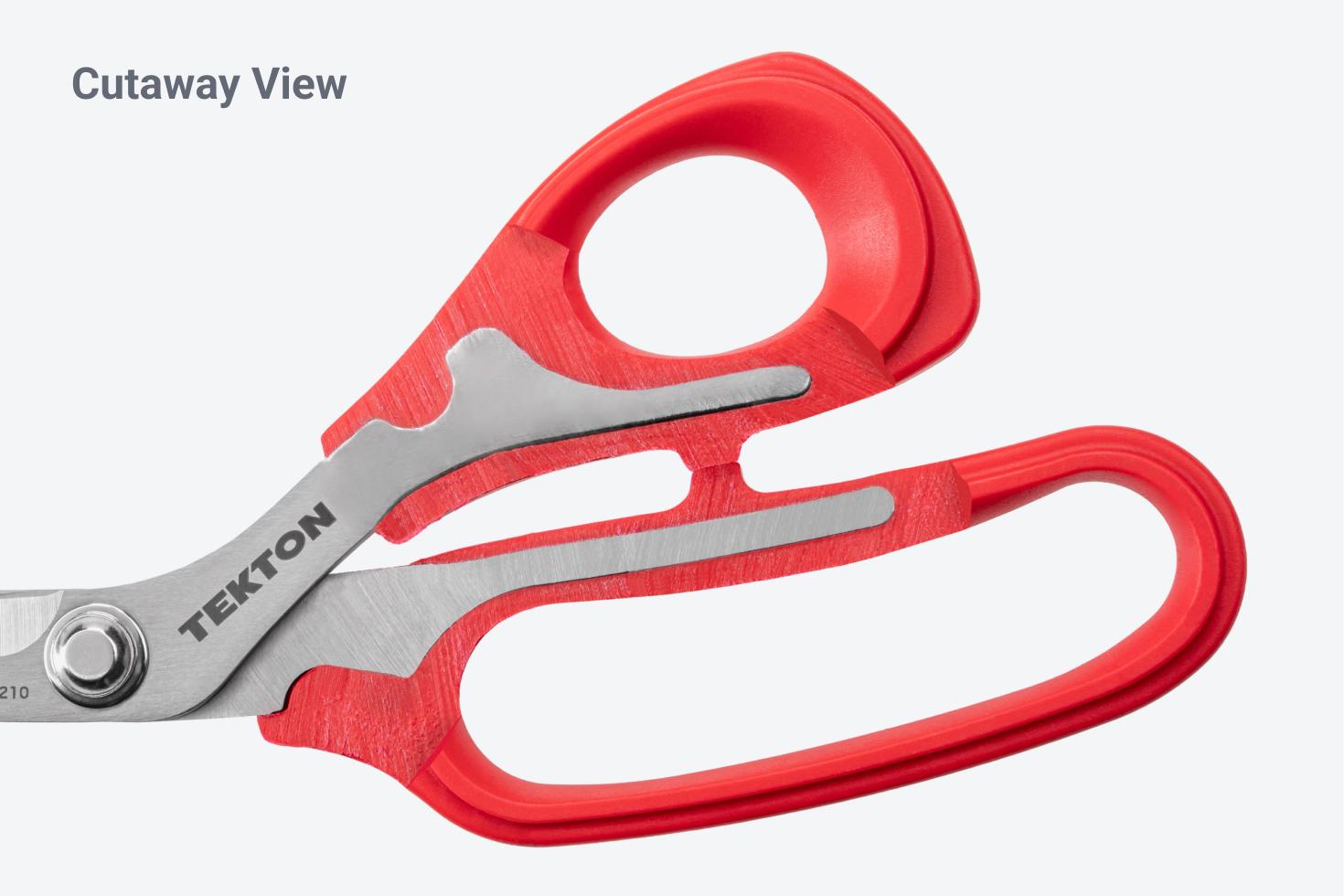 The handle of the scissors cut in half, showing the blade shanks extending deep into the handles