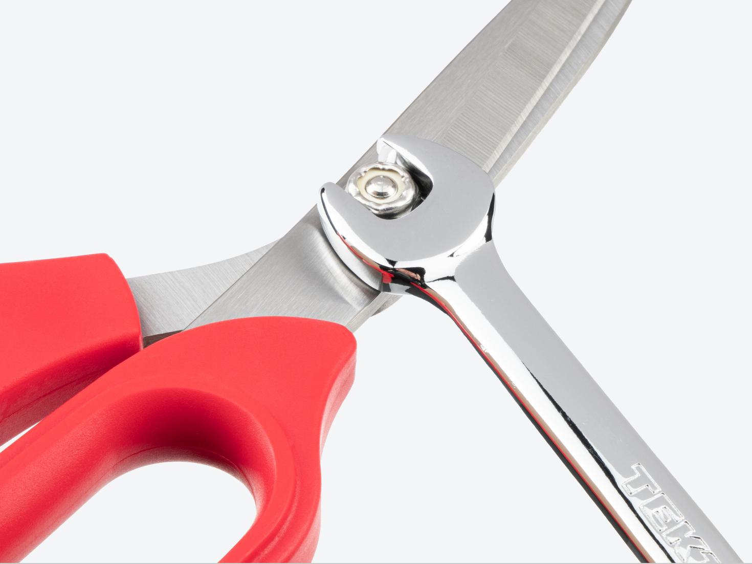 A combination wrench being used to tighten the joint