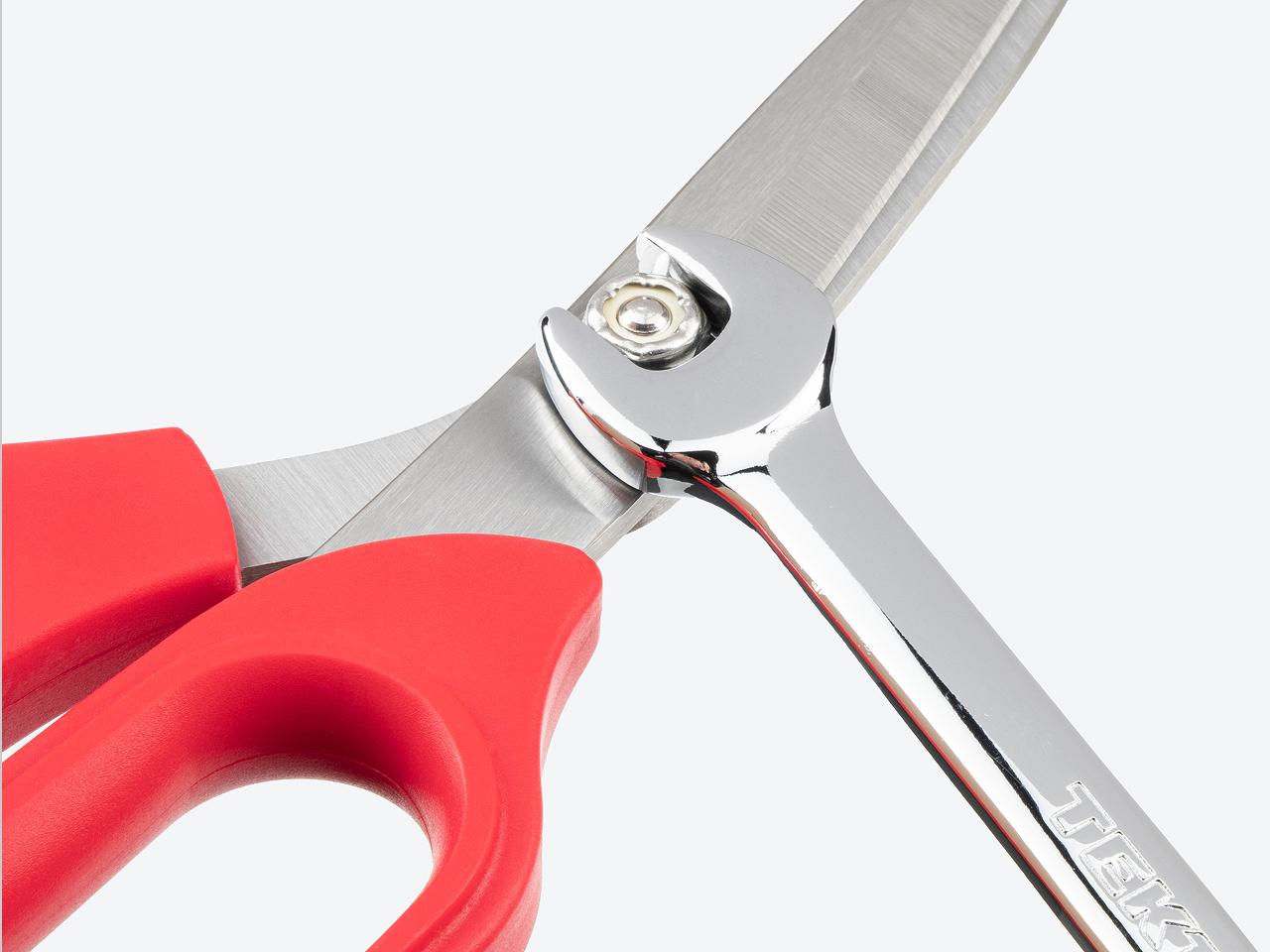 A combination wrench being used to tighten the joint