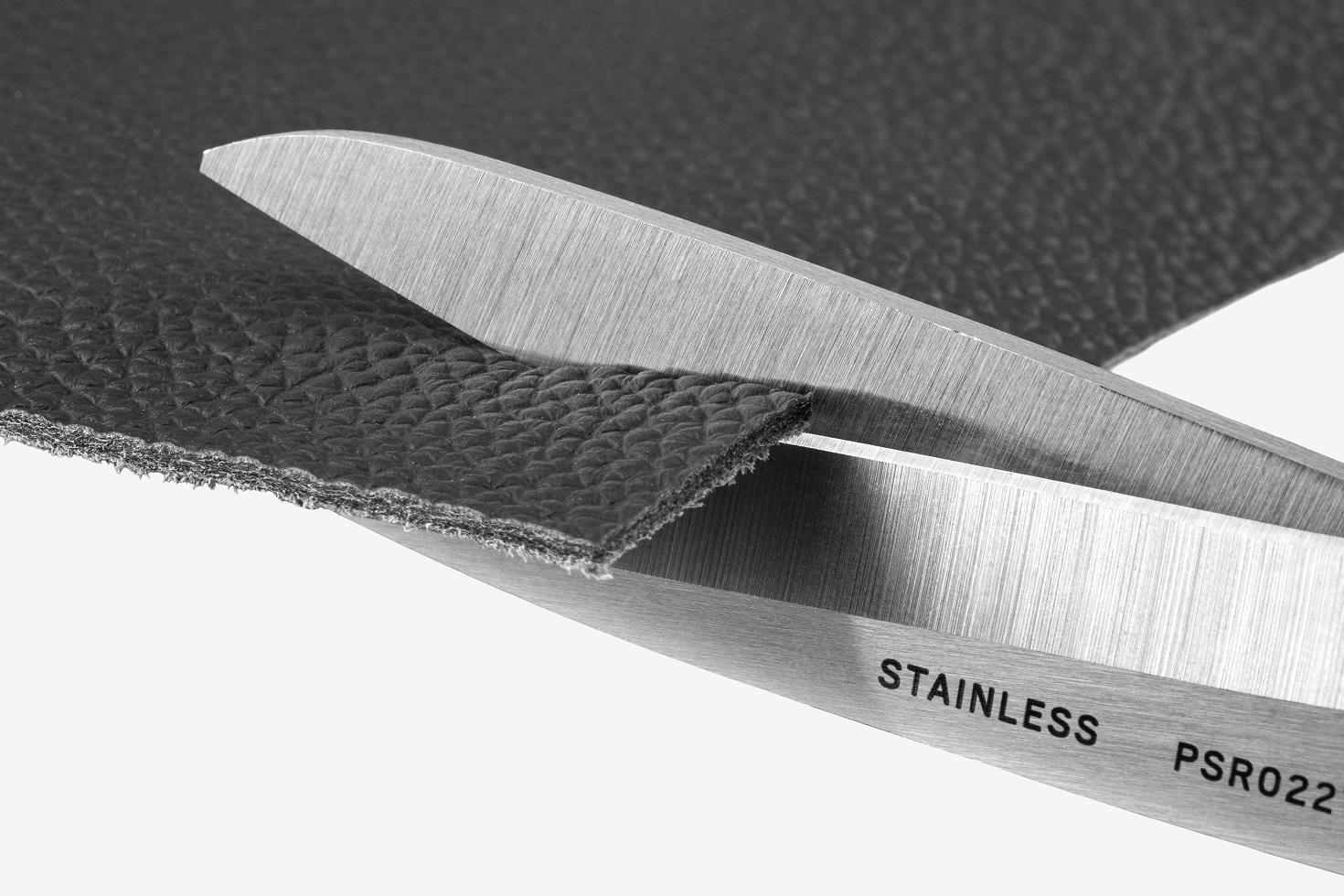 Scissors cutting material