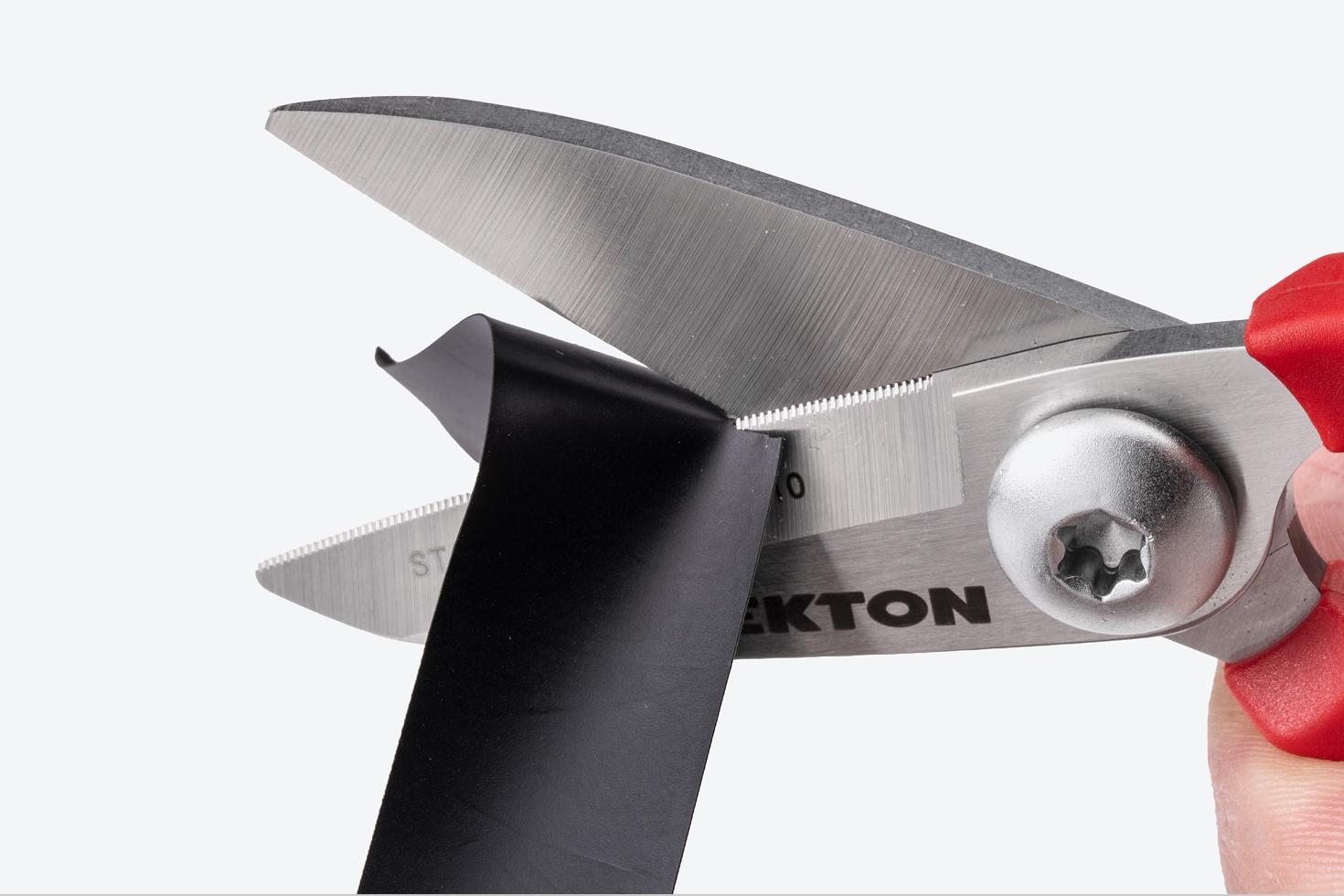 Scissors cutting electrical tape