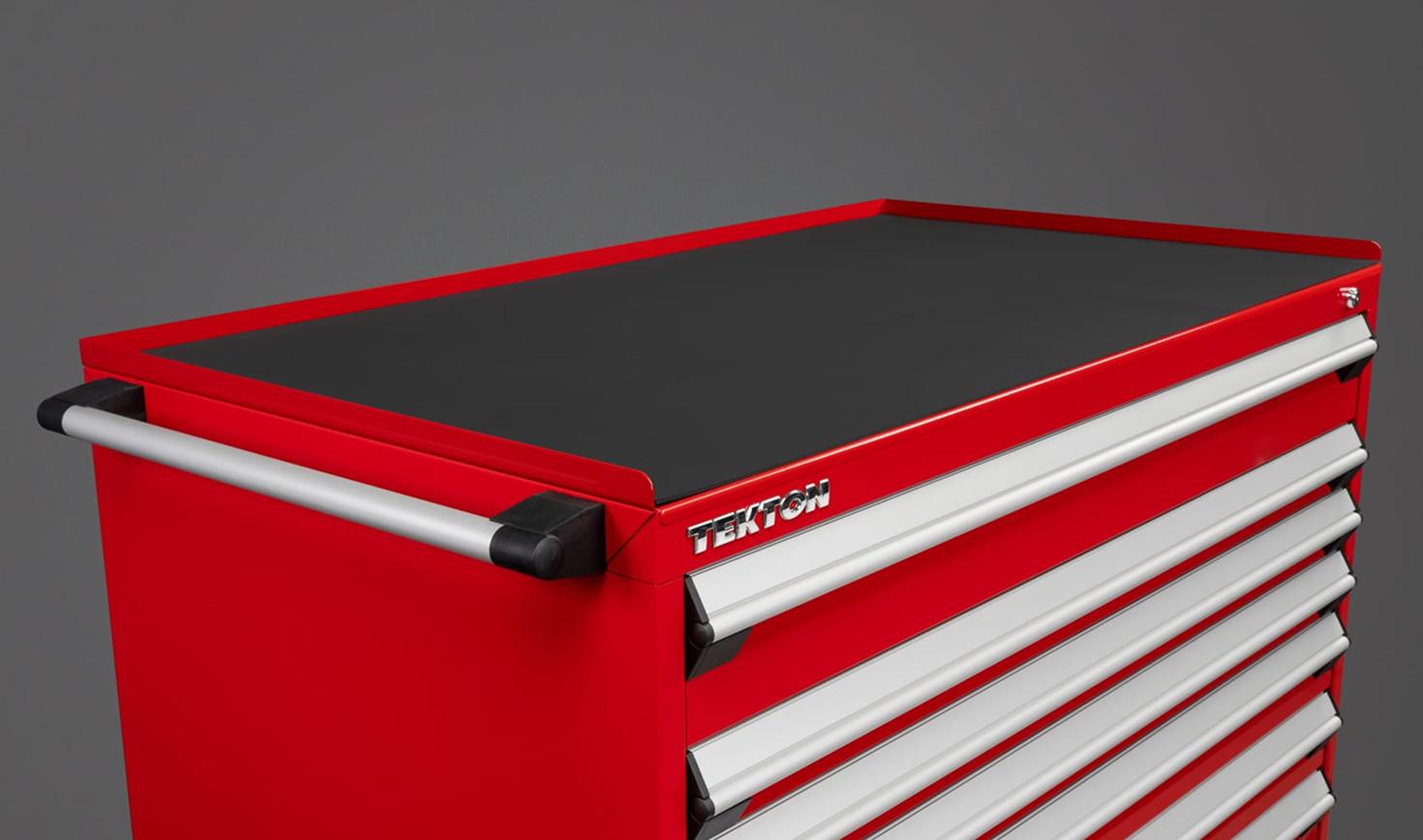 A red Tekton tool cabinet with a red painted steel cabinet top with rubber mat