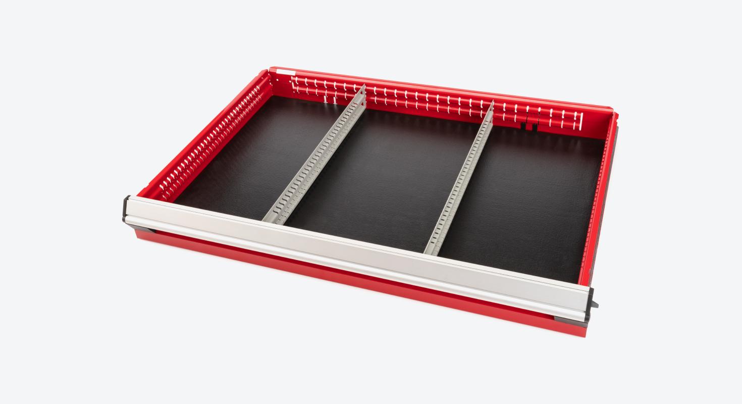 Two partitions in the drawer of a red Tekton tool cabinet