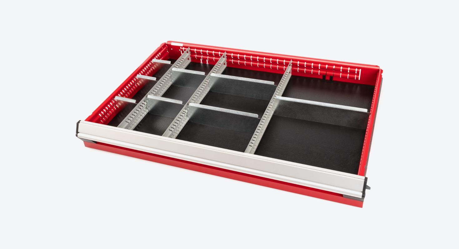 Three partitions with eight subdividers in the drawer of a red Tekton tool cabinet