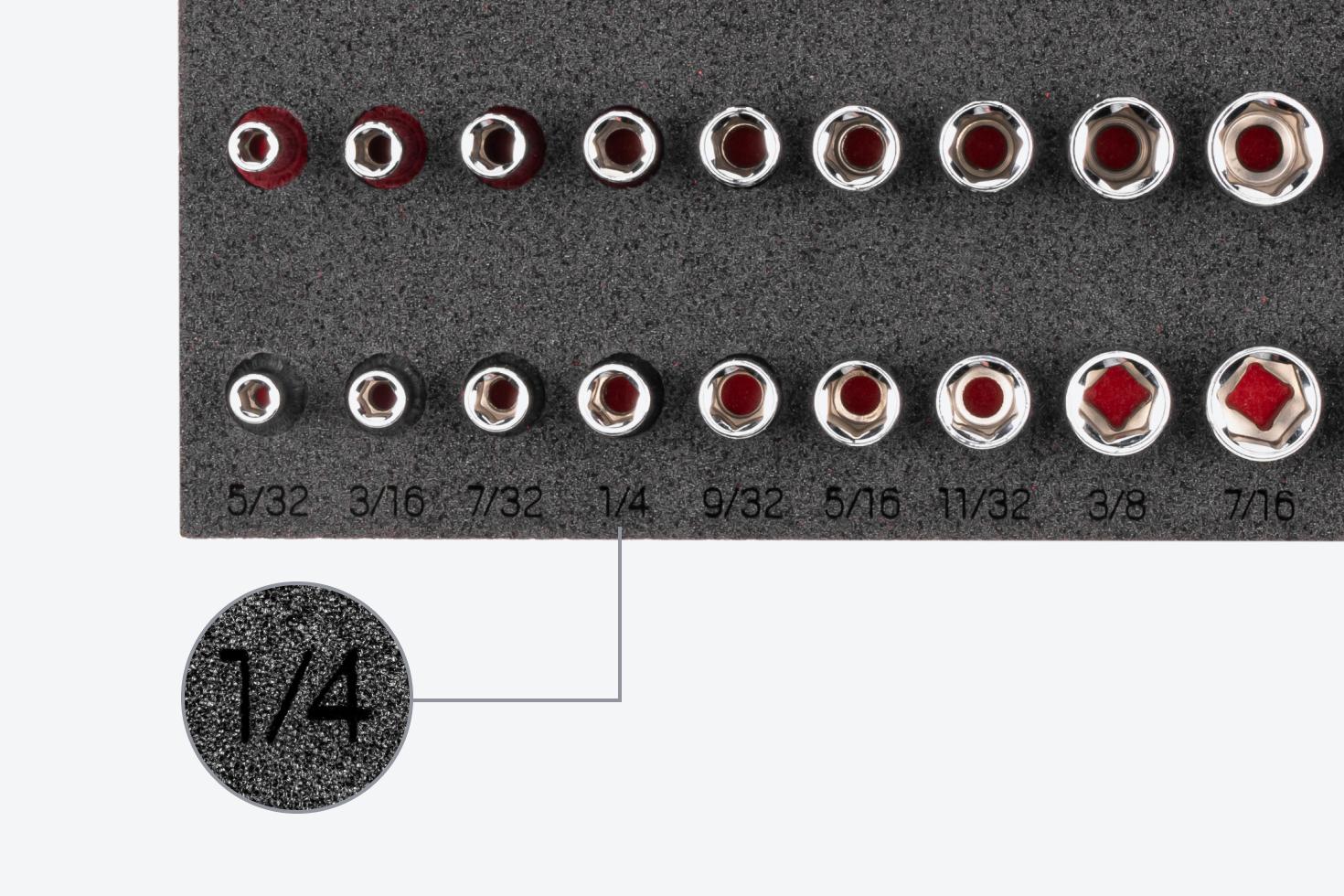 Close up image of the "1/4" marking on an organizer with inch-size sockets