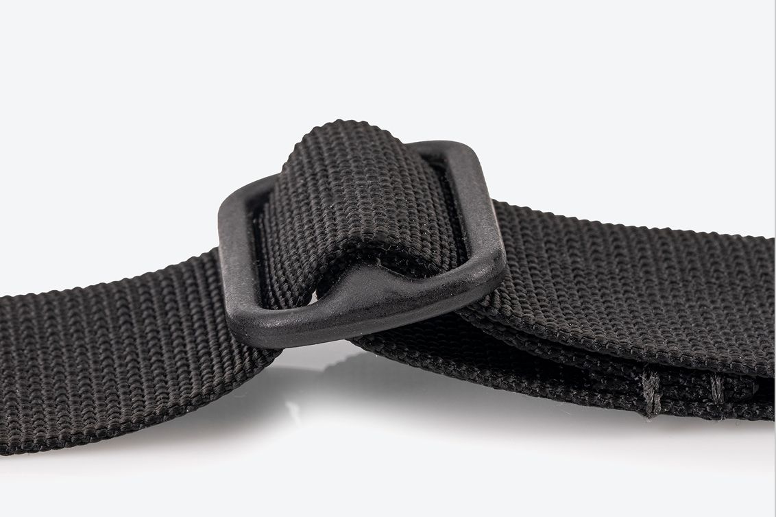 Close-up view of the metal adjustment slider on a strap