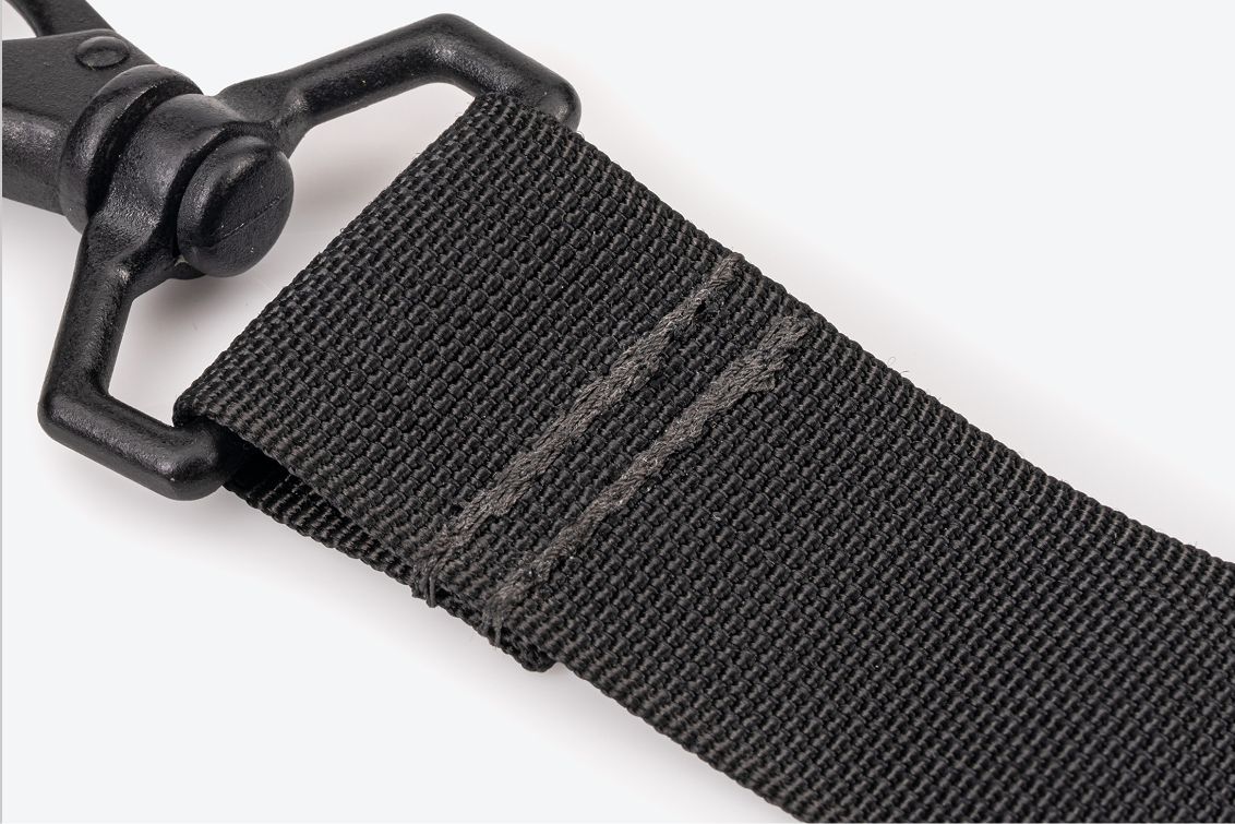 Close-up view of the stitching near the hook on a strap