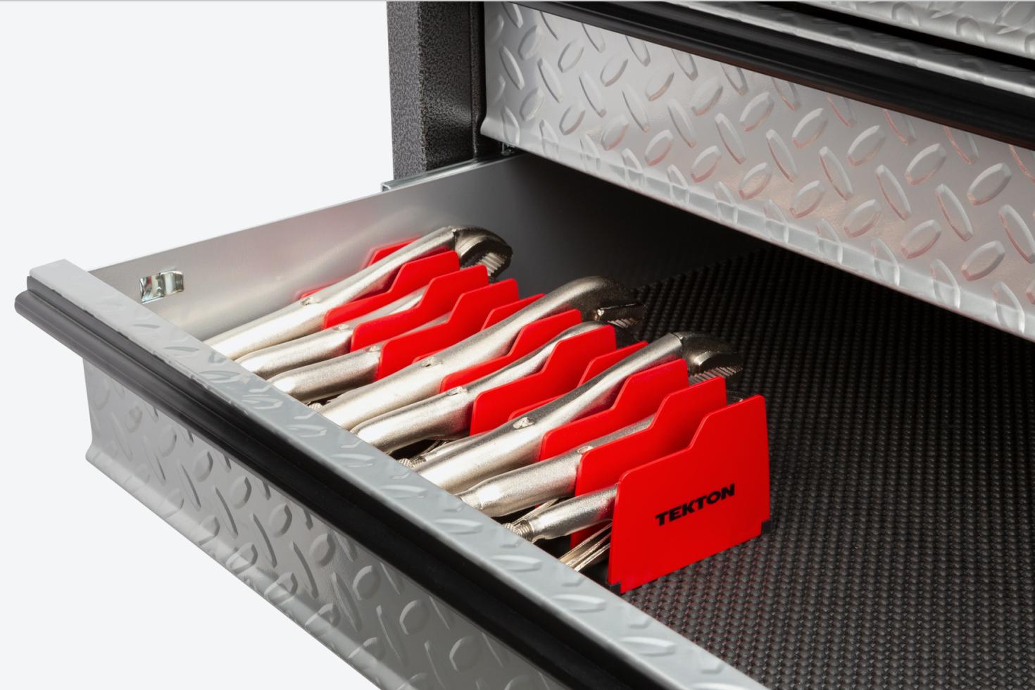 A rack with pliers in the drawer of a tool cabinet
