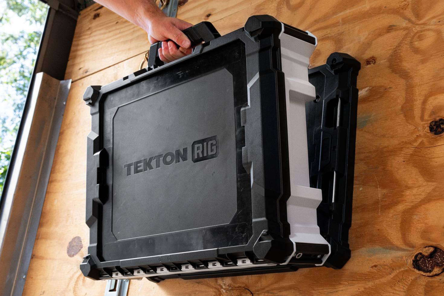 A RIG tool box mounted to the wall of an enclosed trailer