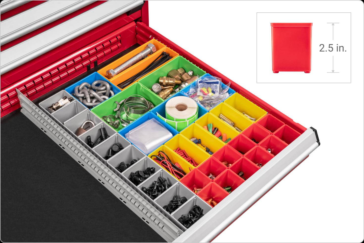 Organizer bins in a tool cabinet drawer
