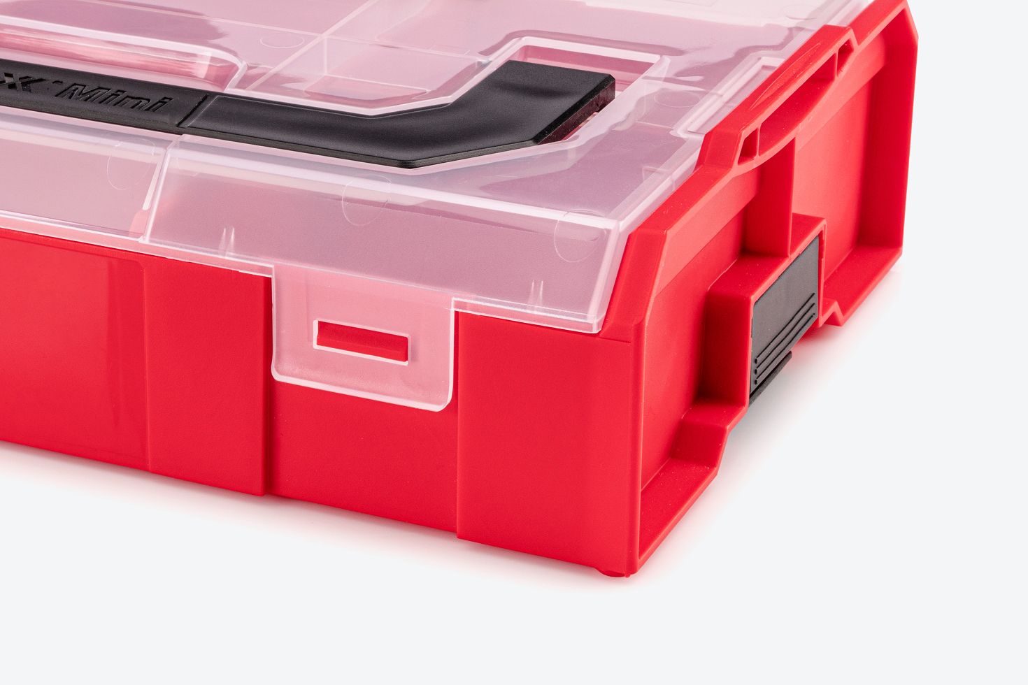 Close-up view of the exterior of a red mini stacking tool box.