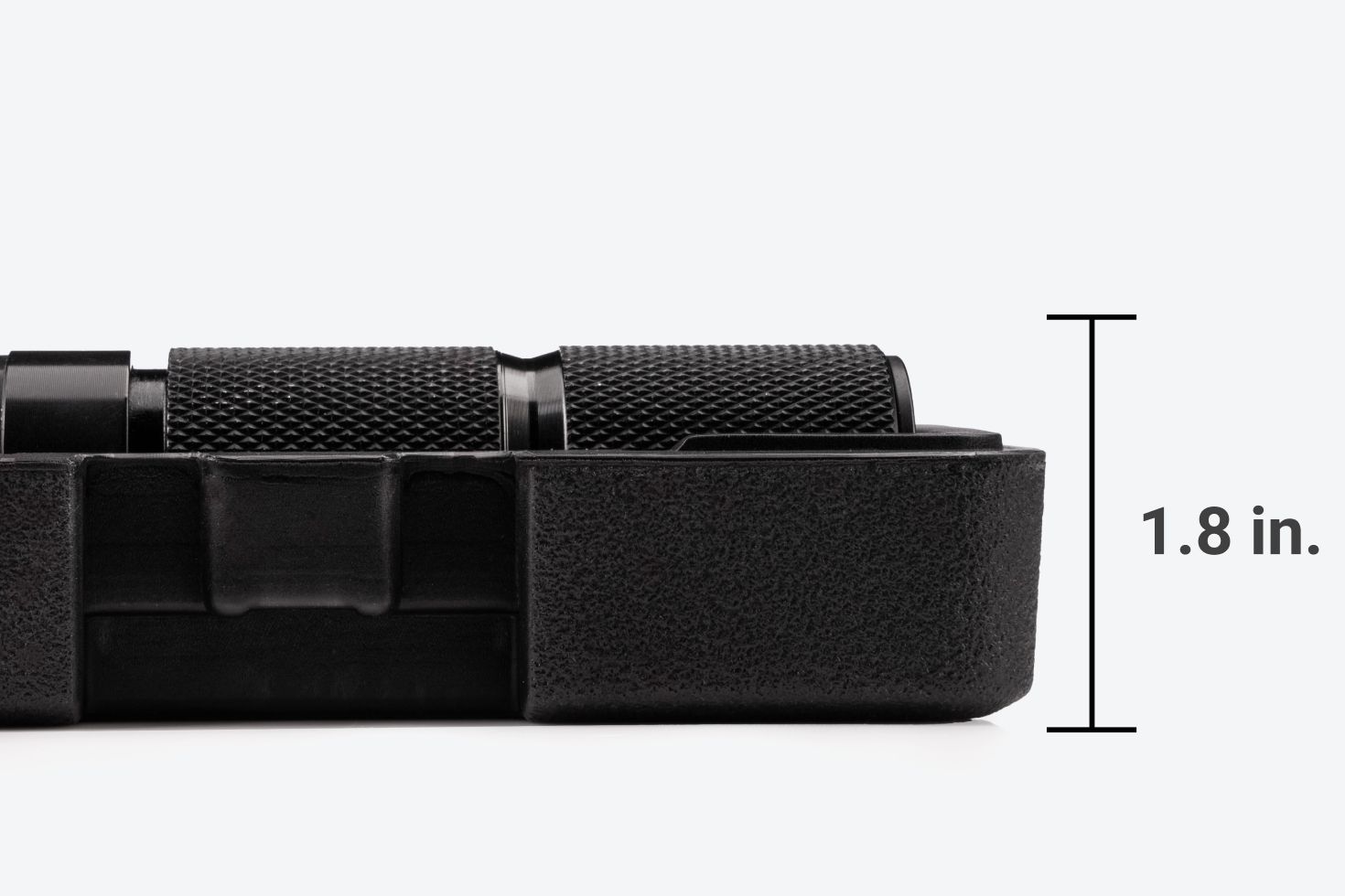 With the lid off, the case and wrench are 1.8 inches tall.