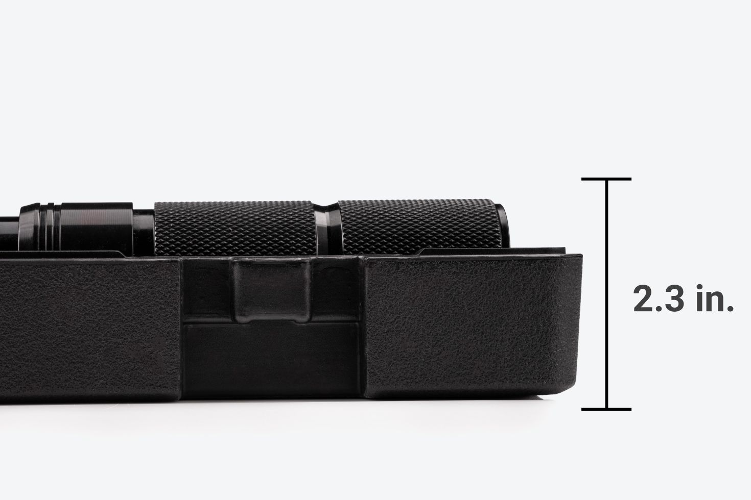 With the lid off, the case and wrench are 2.3 inches tall.