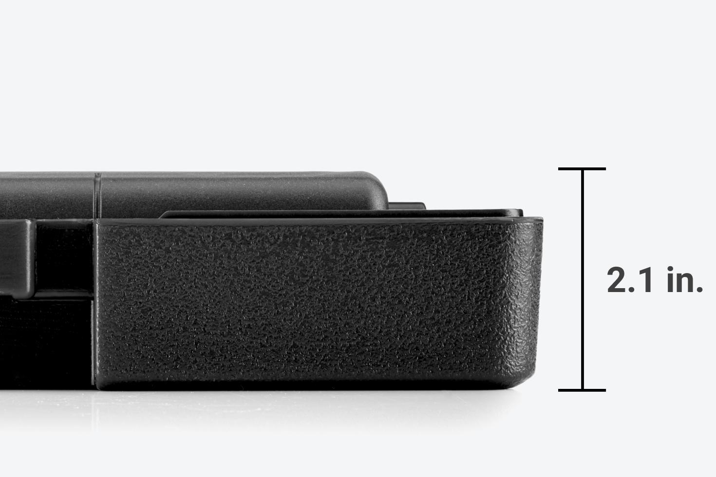 With the lid off, the case and wrench are 2.1 inches tall.