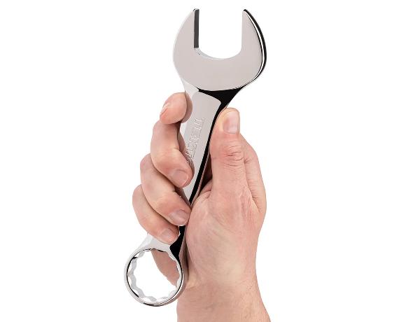 A person holding #18060 Tekton 1-1/4 stubby combination wrench