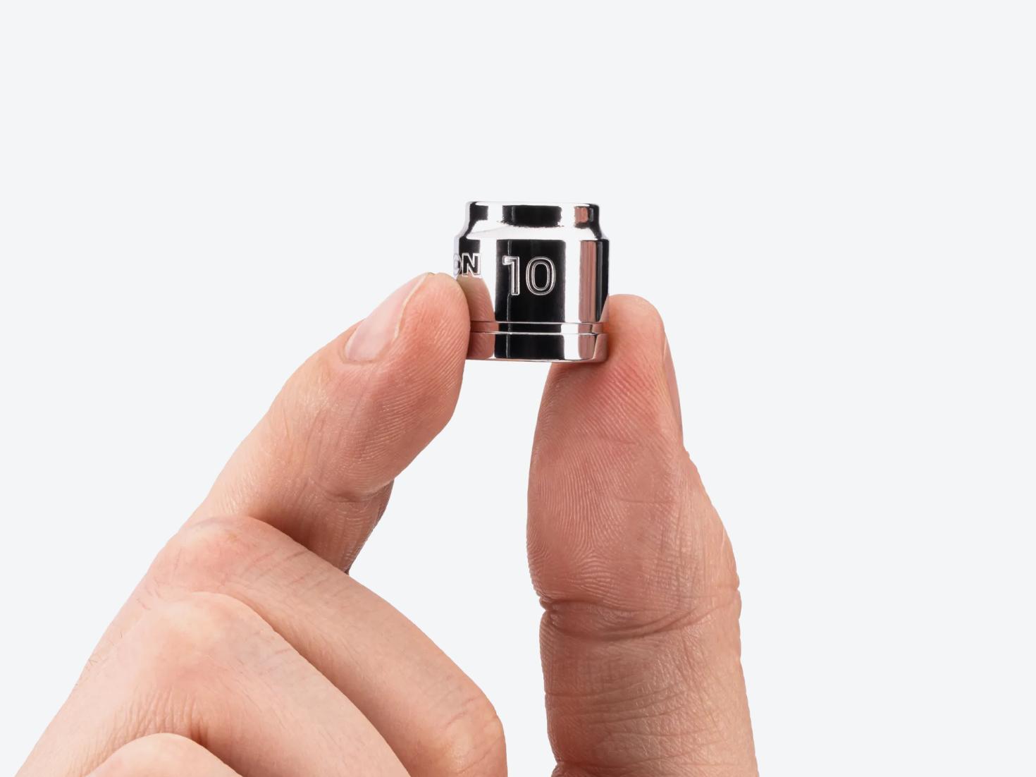 A hand holding a Tekton 3/8 Inch Drive x 10 mm Extra-Shallow 6-Point Socket #SHD11110