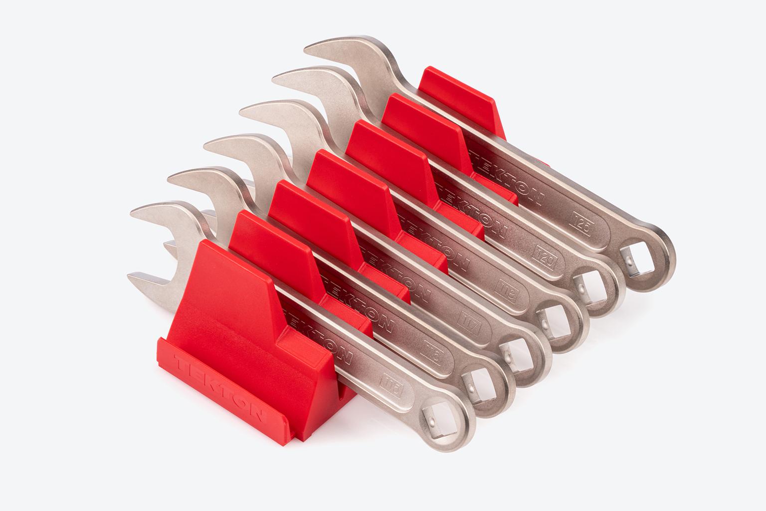 A metric service wrench set in red modular wrench organizers.