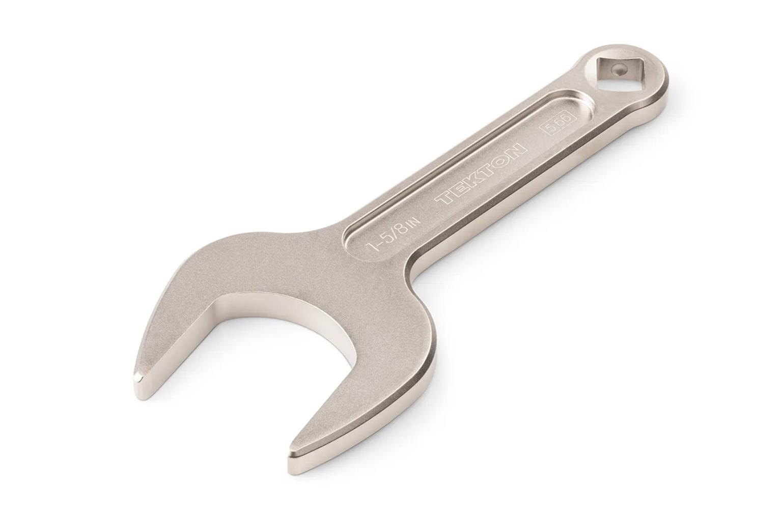 A Tekton 1-1/2 inch service wrench on a white background.